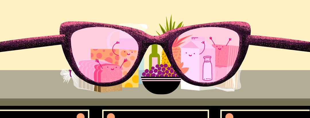 Different foods are sitting on a countertop. A pair of glasses with pink lens reveals that the diary, grains, and gluten products are smiling and waving at the viewer.
