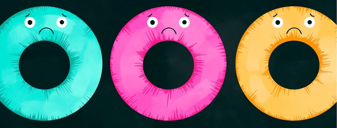 Three inflatable hemorrhoid donuts look upset.