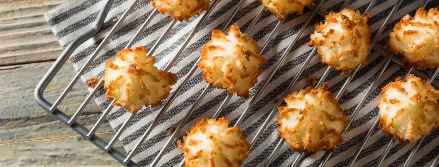 Coconut macaroons on a table.
