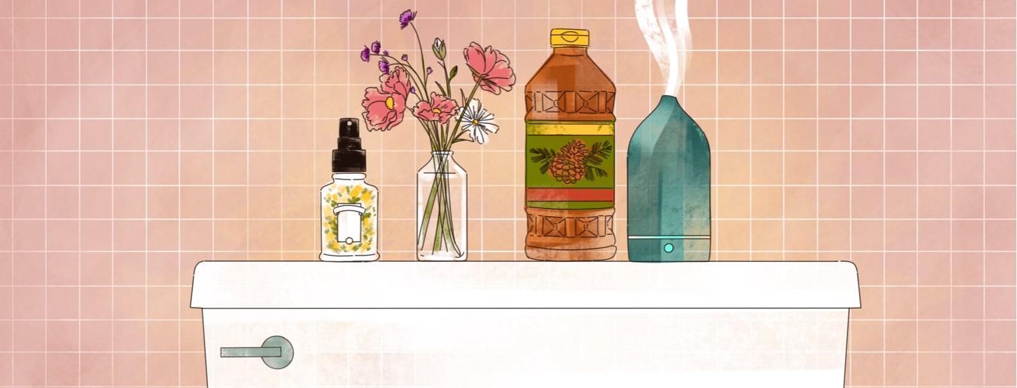 alt=various fresh-smell products including air freshener, flowers, Pine-Sol and an essential oil diffuser sit atop a toilet in a bathroom.
