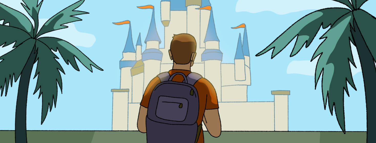 A man wearing a backpack stands in front of the magic castle at disney.